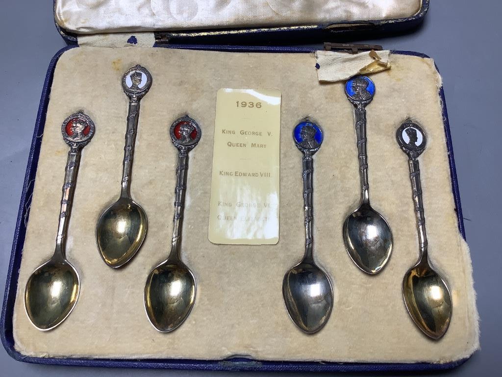 Three cased sets including silver teaspoons, a silver toast rack, three silver napkin rings and a quantity of minor silver flatware.